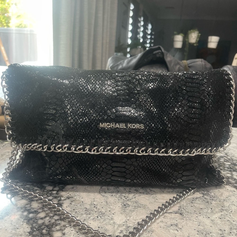 Black snake skin Michael’s kors bag with silver hardware